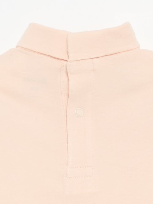 Camiseta de cuello alto con lazo animado - Kiabi Camiseta de cuello alto con lazo animado - Kiabi