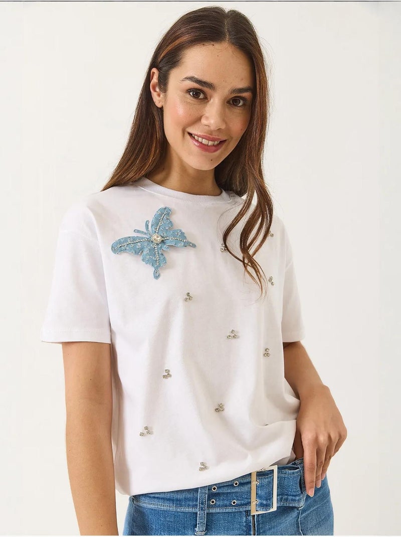 Camiseta de manga corta con accesorios de mariposa y adornos de piedras lucci Blanco - Kiabi