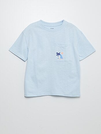 Camiseta de manga corta con bolsillo en el pecho y estampados