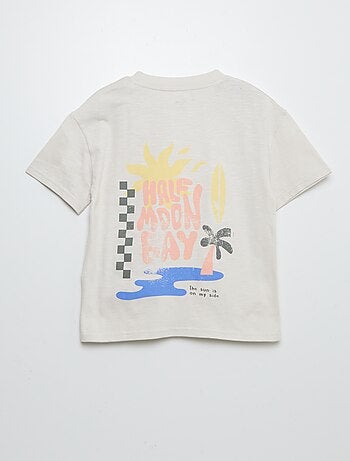 Camiseta de manga corta con bolsillo en el pecho y estampados
