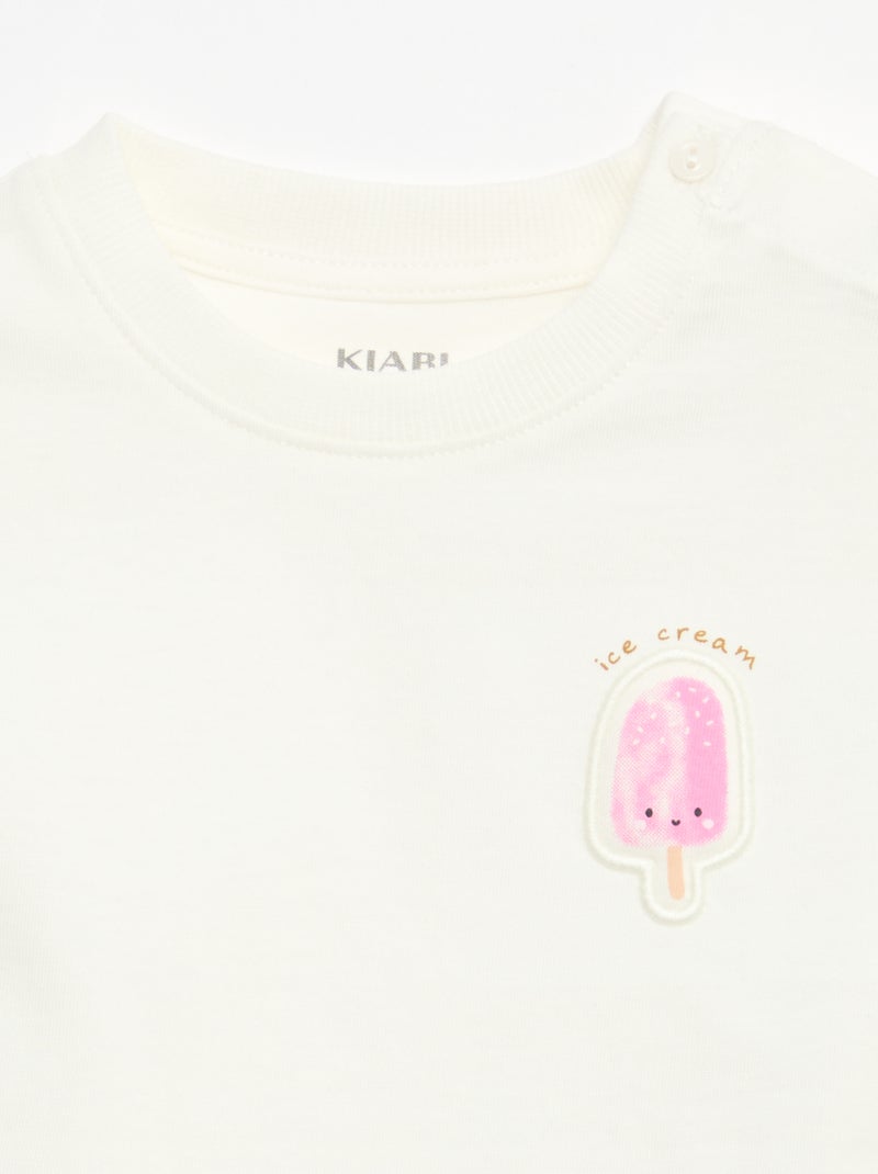 Camiseta de manga corta en punto de algodón con parche en el pecho Blanco - Kiabi