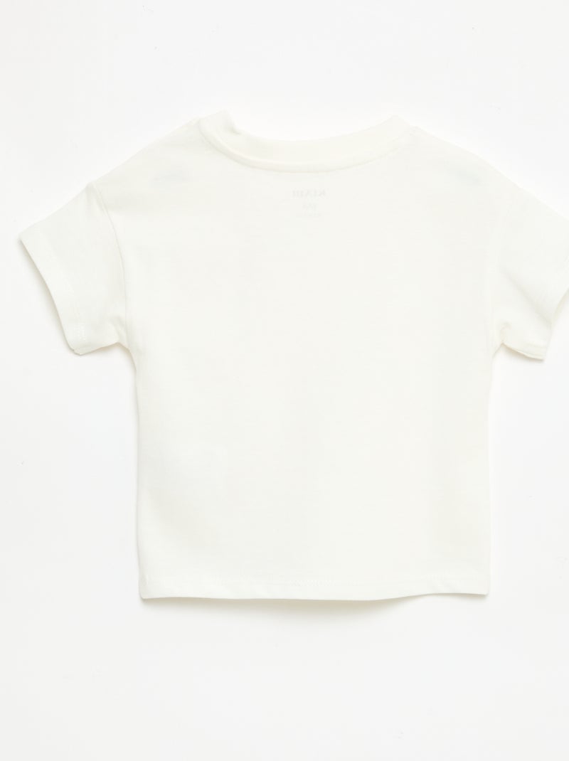 Camiseta de manga corta en punto de algodón con parche en el pecho Blanco - Kiabi