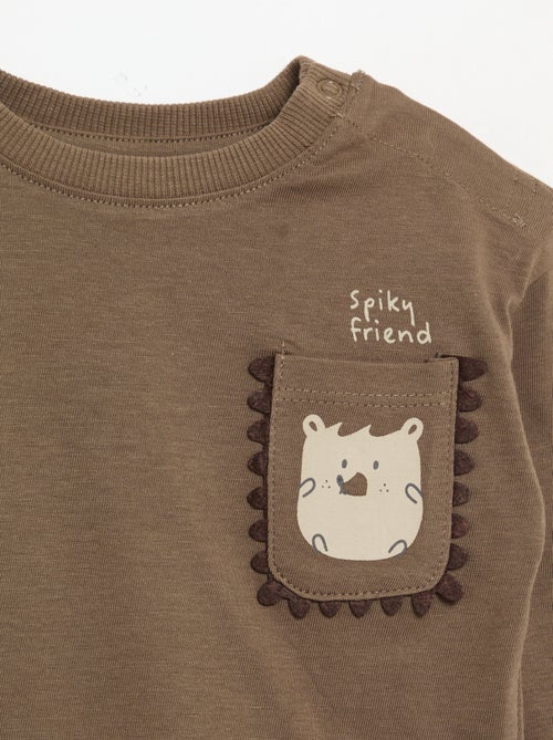 Camiseta de manga larga con bolsillo animado - Kiabi