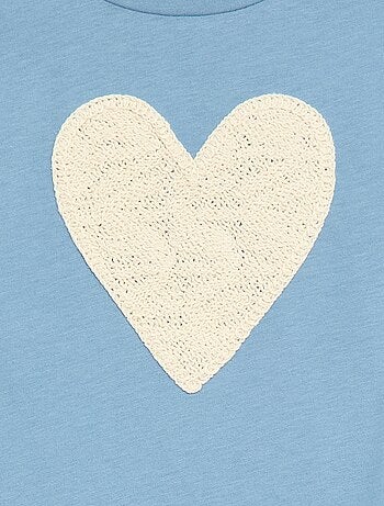 Camiseta de manga larga con diseño bordado en la parte delantera