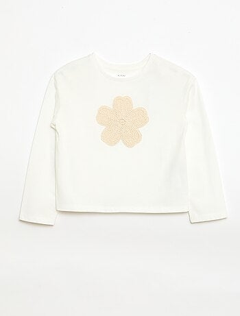 Camiseta de manga larga con diseño bordado en la parte delantera