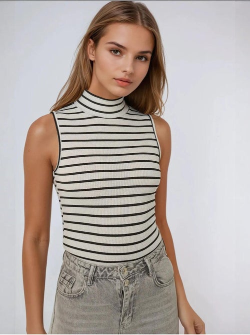 Camiseta de tirantes acanalada a rayas con cuello alto medio hiccup - Kiabi Camiseta de tirantes acanalada a rayas con cuello alto medio hiccup - Kiabi