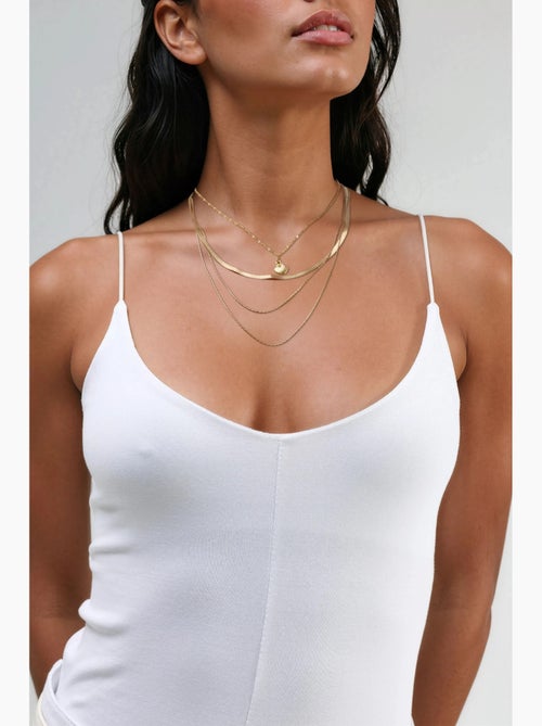 Camiseta de tirantes canalé escote redondo ajustada busem - Kiabi Camiseta de tirantes canalé escote redondo ajustada busem - Kiabi
