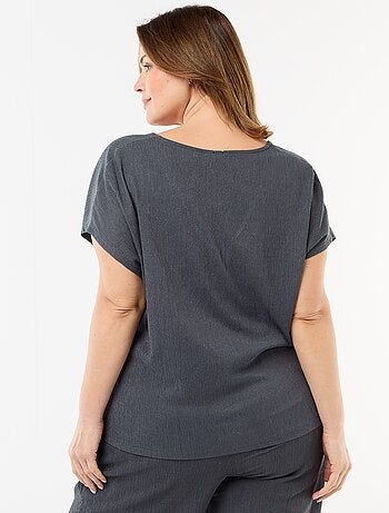 Camiseta de tirantes con botones dorados