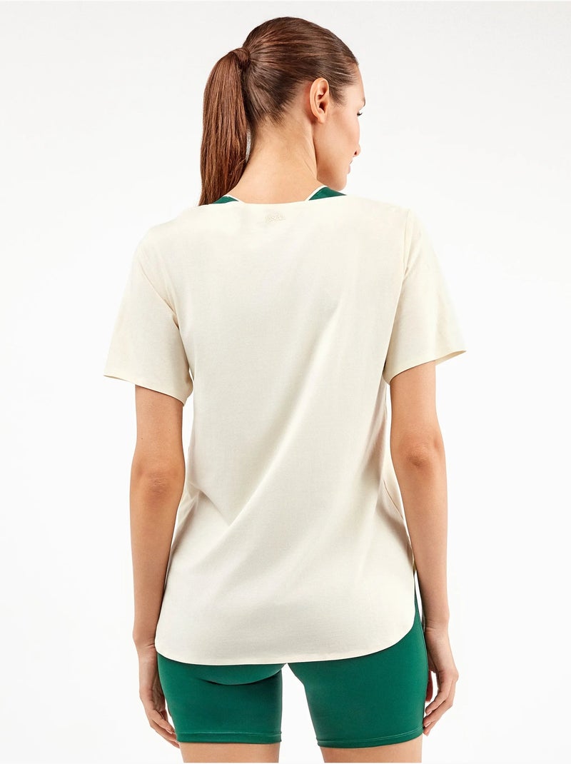 Camiseta deportiva manga corta con aperturas laterales Beige - Kiabi