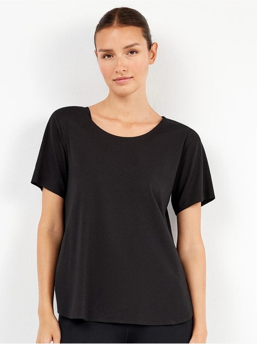 Camiseta deportiva manga corta con aperturas laterales - Kiabi Camiseta deportiva manga corta con aperturas laterales - Kiabi