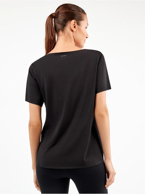 Camiseta deportiva manga corta con aperturas laterales - Kiabi Camiseta deportiva manga corta con aperturas laterales - Kiabi