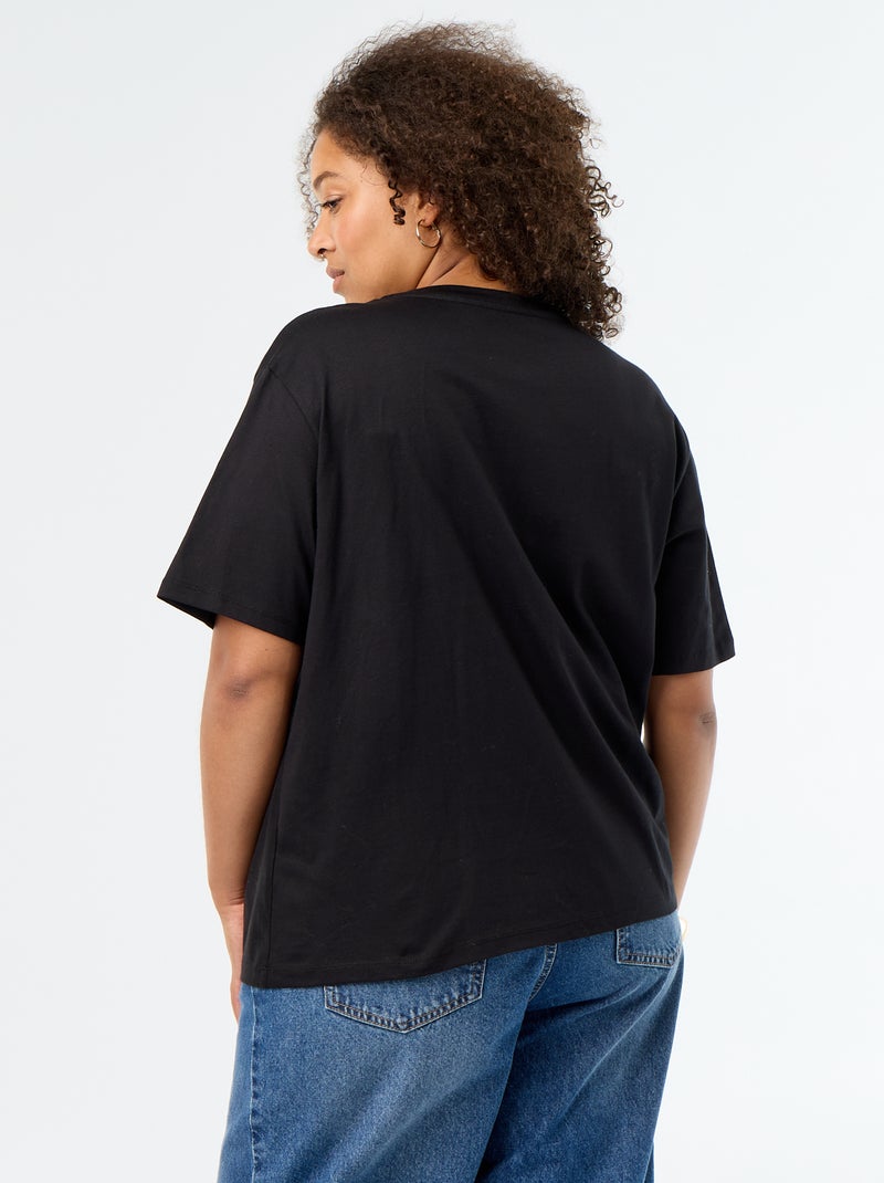 Camiseta drapeada con joya dorada tipo broche Negro - Kiabi