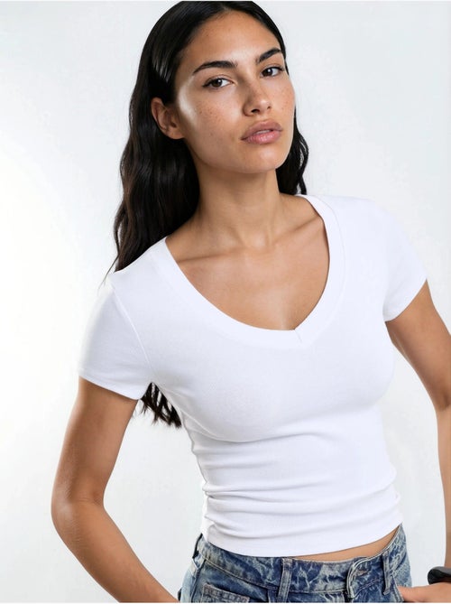 Camiseta elástica de manga corta con cuello en v busem - Kiabi Camiseta elástica de manga corta con cuello en v busem - Kiabi