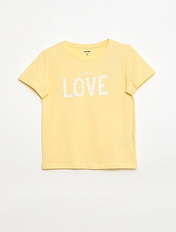 Camiseta estampada con mensaje y manga corta