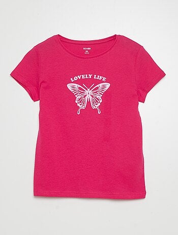 Camiseta de manga corta de color rosa pastel con estampado de niña y pavo  real para niña