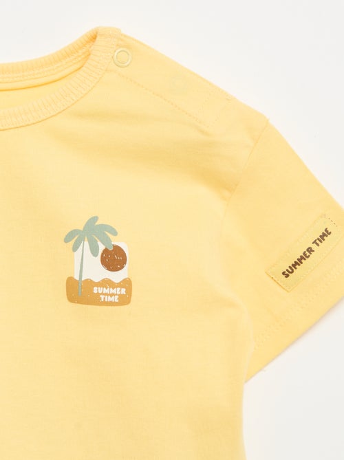 Camiseta estampada tropical de manga corta en algodón - Kiabi Camiseta estampada tropical de manga corta en algodón - Kiabi