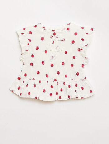 Camiseta estampada y con volantes