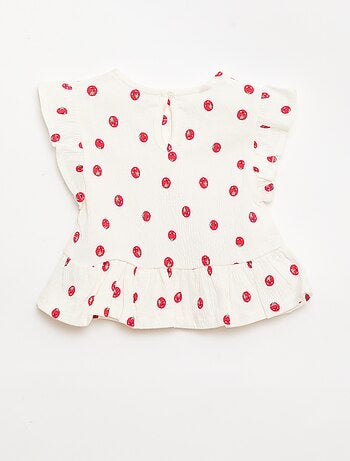 Camiseta estampada y con volantes