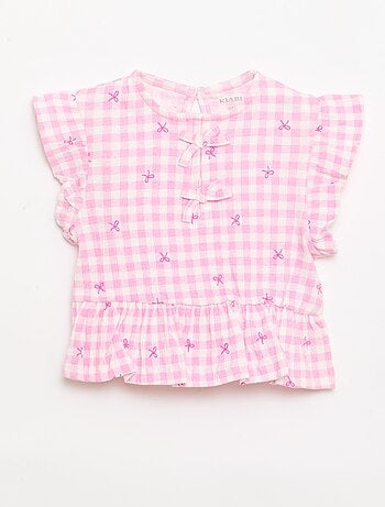 Camiseta estampada y con volantes