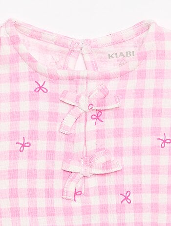 Camiseta estampada y con volantes
