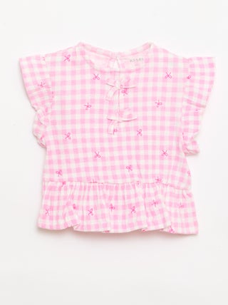 Camiseta estampada y con volantes