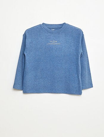 Camiseta corte holgado con diseño en el pecho