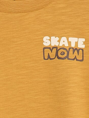 Camiseta holgada estampada skate