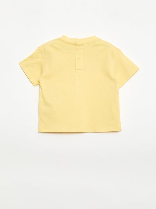 Camiseta lisa con flores de fantasía en el cuello - Kiabi