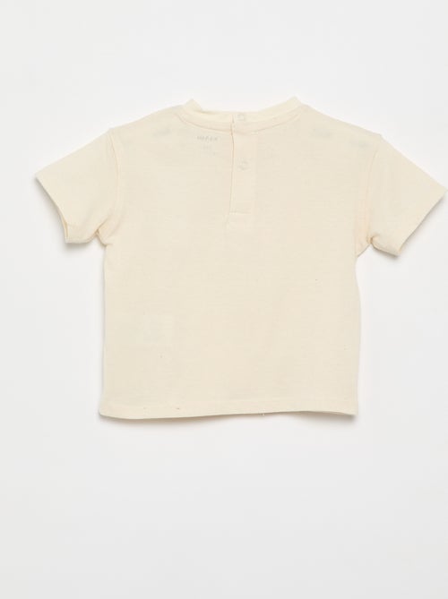 Camiseta lisa con flores de fantasía en el cuello - Kiabi