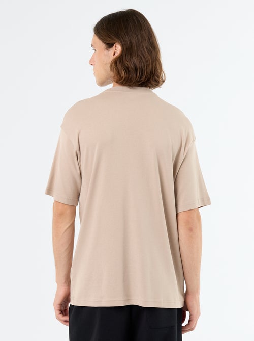 Camiseta lisa de manga corta y cuello redondo - Kiabi Camiseta lisa de manga corta y cuello redondo - Kiabi