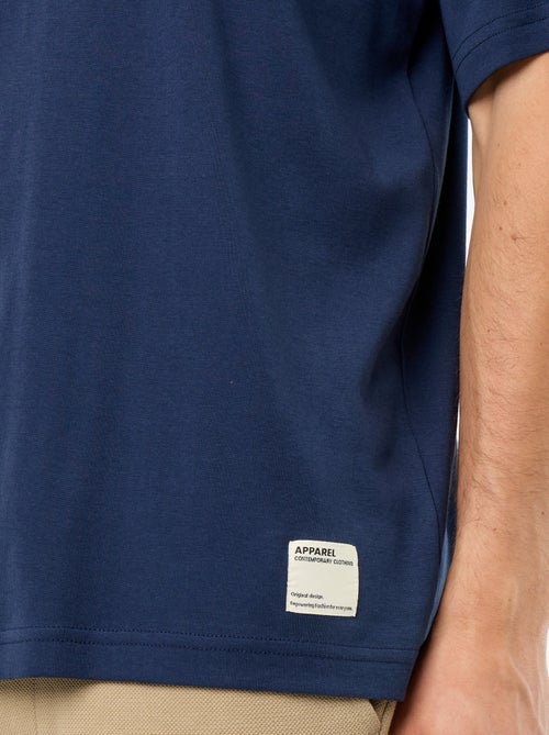 Camiseta lisa de manga corta y cuello redondo - Kiabi Camiseta lisa de manga corta y cuello redondo - Kiabi