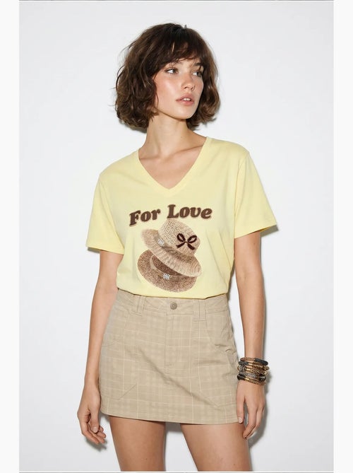 Camiseta oversize con cuello de pico y estampado lucci - Kiabi Camiseta oversize con cuello de pico y estampado lucci - Kiabi