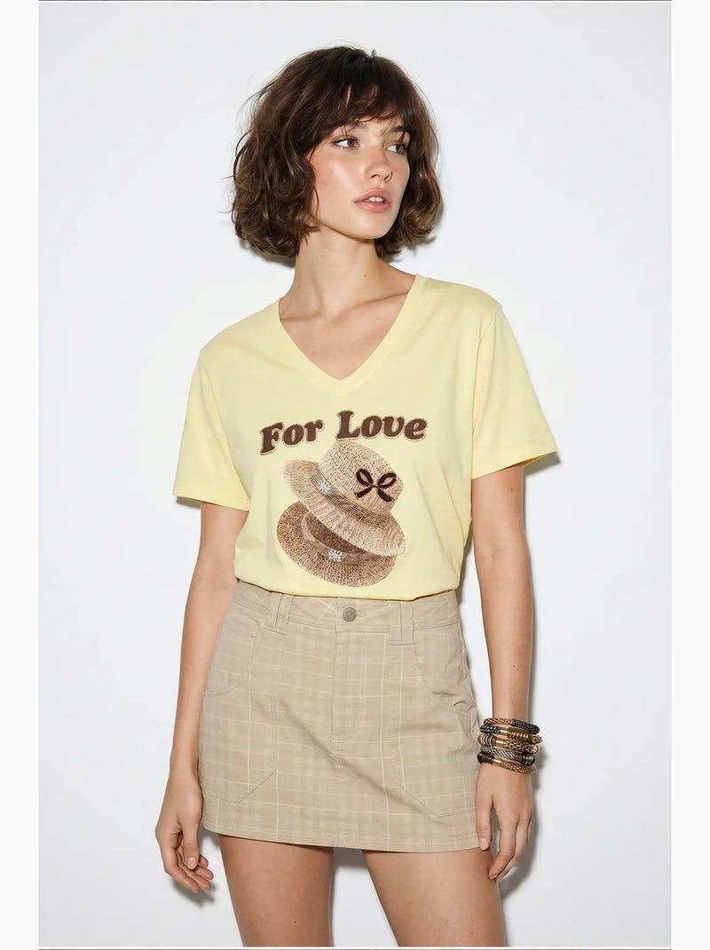 Camiseta oversize con cuello de pico y estampado lucci Amarillo limón - Kiabi