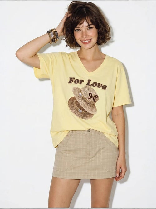 Camiseta oversize con cuello de pico y estampado lucci - Kiabi Camiseta oversize con cuello de pico y estampado lucci - Kiabi