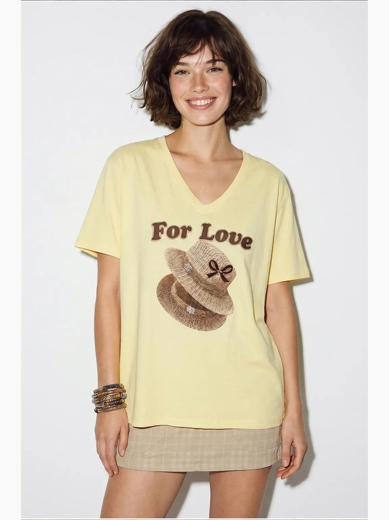 Camiseta oversize con cuello de pico y estampado lucci Amarillo limón - Kiabi
