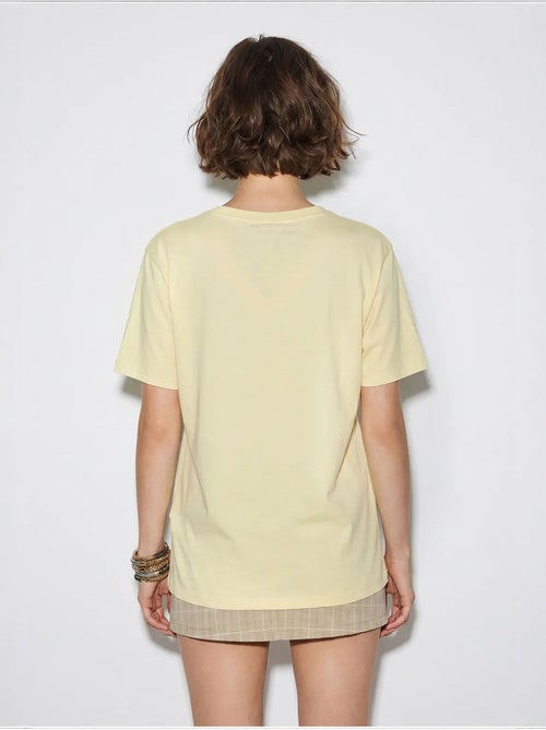 Camiseta oversize con cuello de pico y estampado lucci - Kiabi Camiseta oversize con cuello de pico y estampado lucci - Kiabi