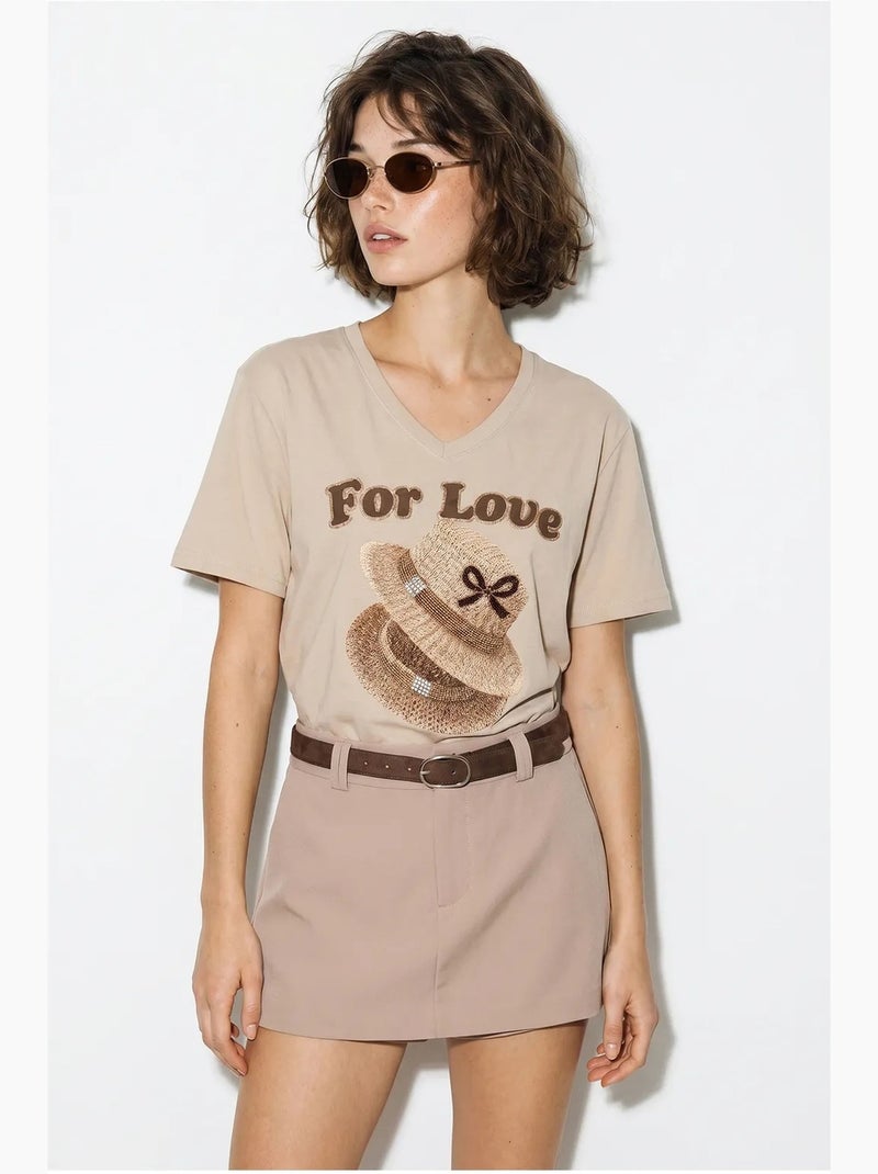 Camiseta oversize con cuello de pico y estampado lucci Beige arcilla - Kiabi