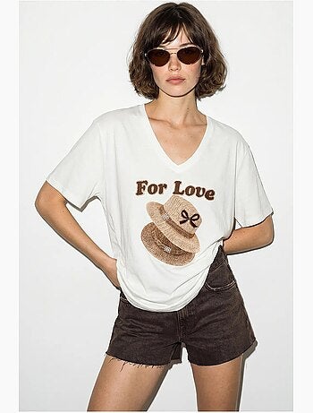 Camiseta oversize con cuello de pico y estampado lucci