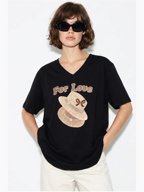 Camiseta oversize con cuello de pico y estampado lucci - Kiabi Camiseta oversize con cuello de pico y estampado lucci - Kiabi