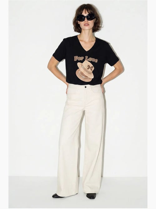 Camiseta oversize con cuello de pico y estampado lucci - Kiabi Camiseta oversize con cuello de pico y estampado lucci - Kiabi