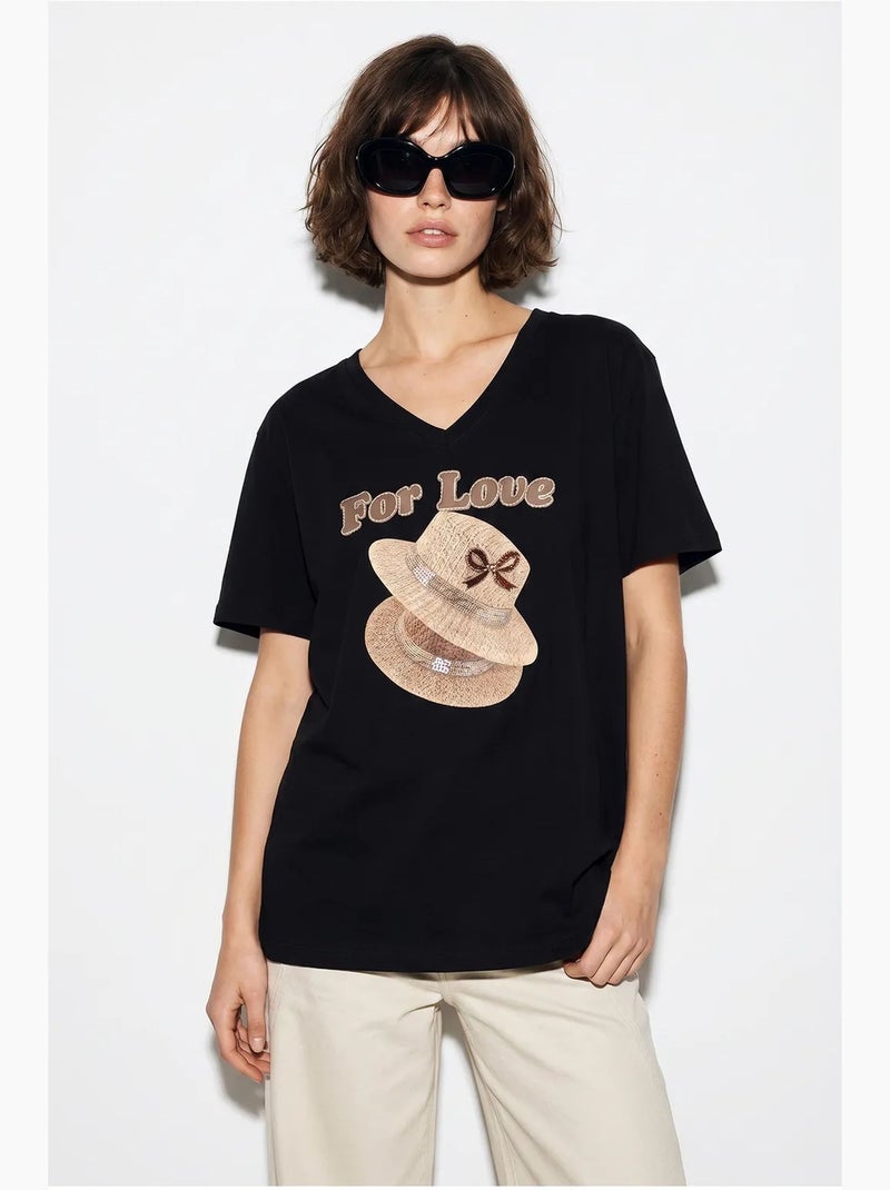 Camiseta oversize con cuello de pico y estampado lucci Negro - Kiabi