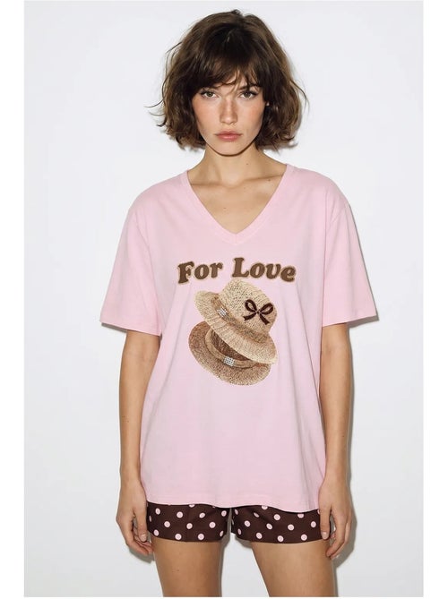 Camiseta oversize con cuello de pico y estampado lucci - Kiabi Camiseta oversize con cuello de pico y estampado lucci - Kiabi