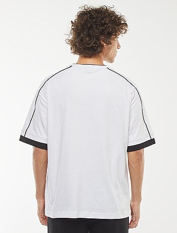 Camiseta oversize con raya