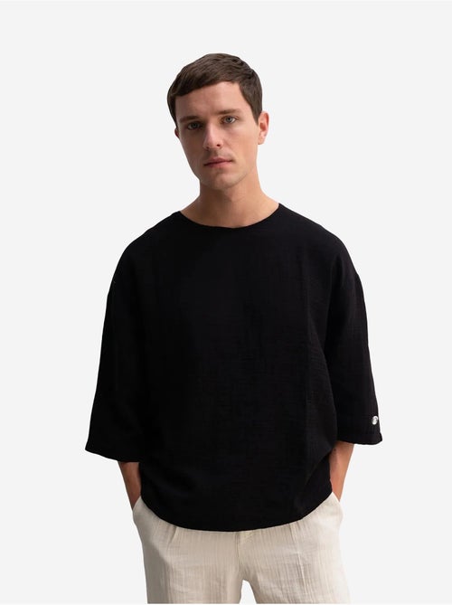 Camiseta oversize de algodón con cuello redondo giesto - Kiabi Camiseta oversize de algodón con cuello redondo giesto - Kiabi