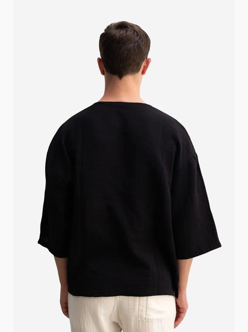 Camiseta oversize de algodón con cuello redondo giesto - Kiabi Camiseta oversize de algodón con cuello redondo giesto - Kiabi