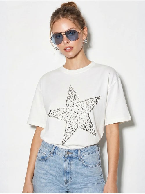 Camiseta oversize de algodón con estrella de lentejuelas lucci - Kiabi Camiseta oversize de algodón con estrella de lentejuelas lucci - Kiabi