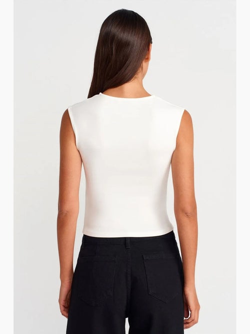 Camiseta sin mangas acanalada de cuello redondo, corte slim dilvin - Kiabi Camiseta sin mangas acanalada de cuello redondo, corte slim dilvin - Kiabi