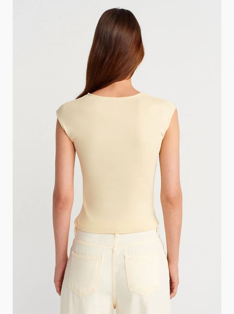 Camiseta sin mangas acanalada de cuello redondo, corte slim dilvin Marfil - Kiabi