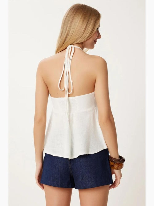 Camiseta sin mangas algodón hombros descubiertos cuello halter istanbul - Kiabi Camiseta sin mangas algodón hombros descubiertos cuello halter istanbul - Kiabi