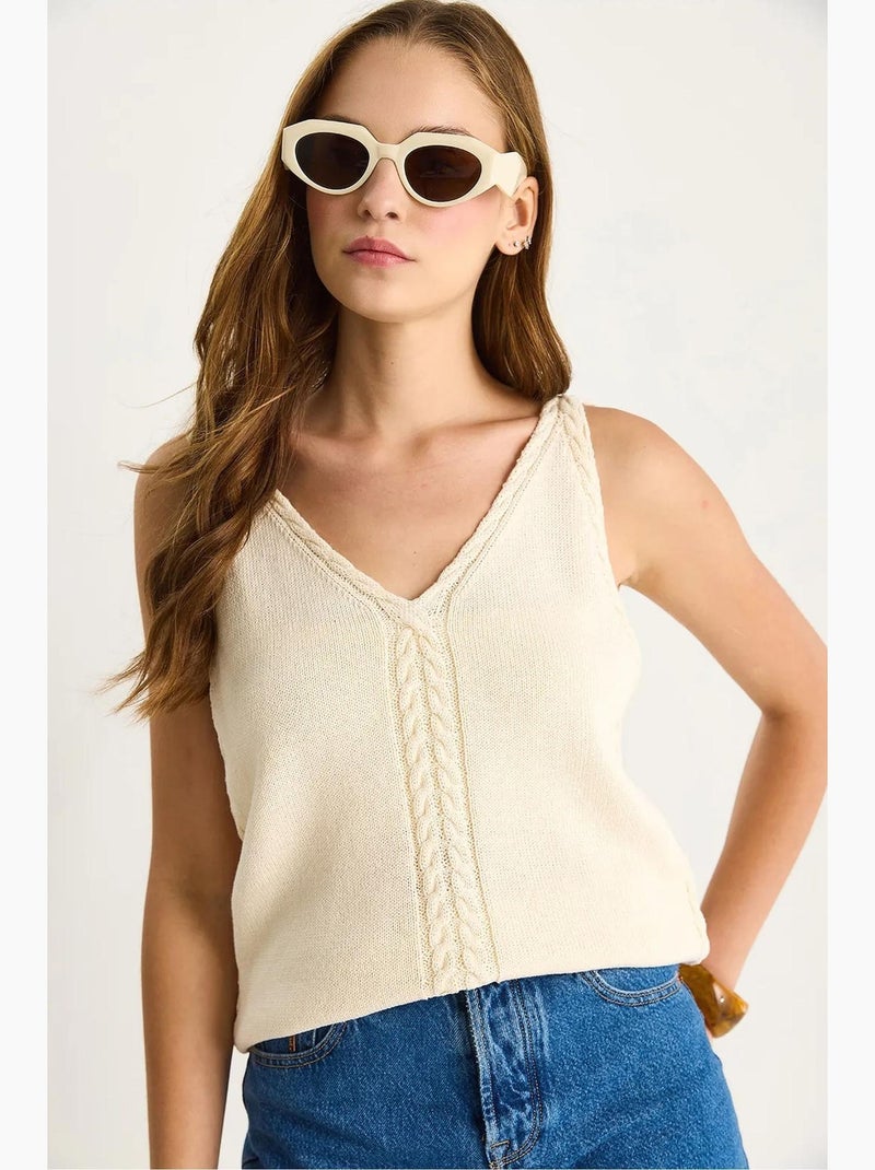 Camiseta sin mangas texturizada escote pico detalle elástico lucci Marfil - Kiabi